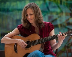 Singer-Songwriter Tracy Grammer will present a workshop on songwriting and showcase her musical talents during The Ladies in the House Online Music Festival. (Photo: Ben Bernhardt)