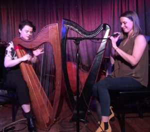 A twin-harp interlude during Ken Waldman's roots music variety show  featured (l-r) Mairi Chaimbeaul and Maeve Gilchrist (Photo: Michael Kornfeld)