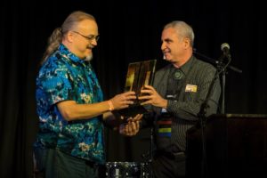 Ron Olesko receives NERFA's 2019 Creator of the Year Award from Michael Kornfeld, the nonprofit organization's board president (Photo: Jake Jacobson)