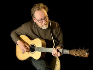 Tim Grimm had the top album and was the most-played artist on folk radio during April 2025.
